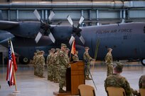 U.S. Army Col. Matthew Schell, commander of the Alaska Army National Guard’s 297th Regional Support Group, reflects on the many accomplishments of the RSG’s support to U.S. Army Europe’s European Deterrence Initiative and Atlantic Resolve mission during a Relief in Place/Transfer of Authority ceremony Feb. 26, 2021, in the hangar of the Powidz Air Base, Powidz, Poland.