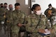 A photo of Airmen processing through a deployment line