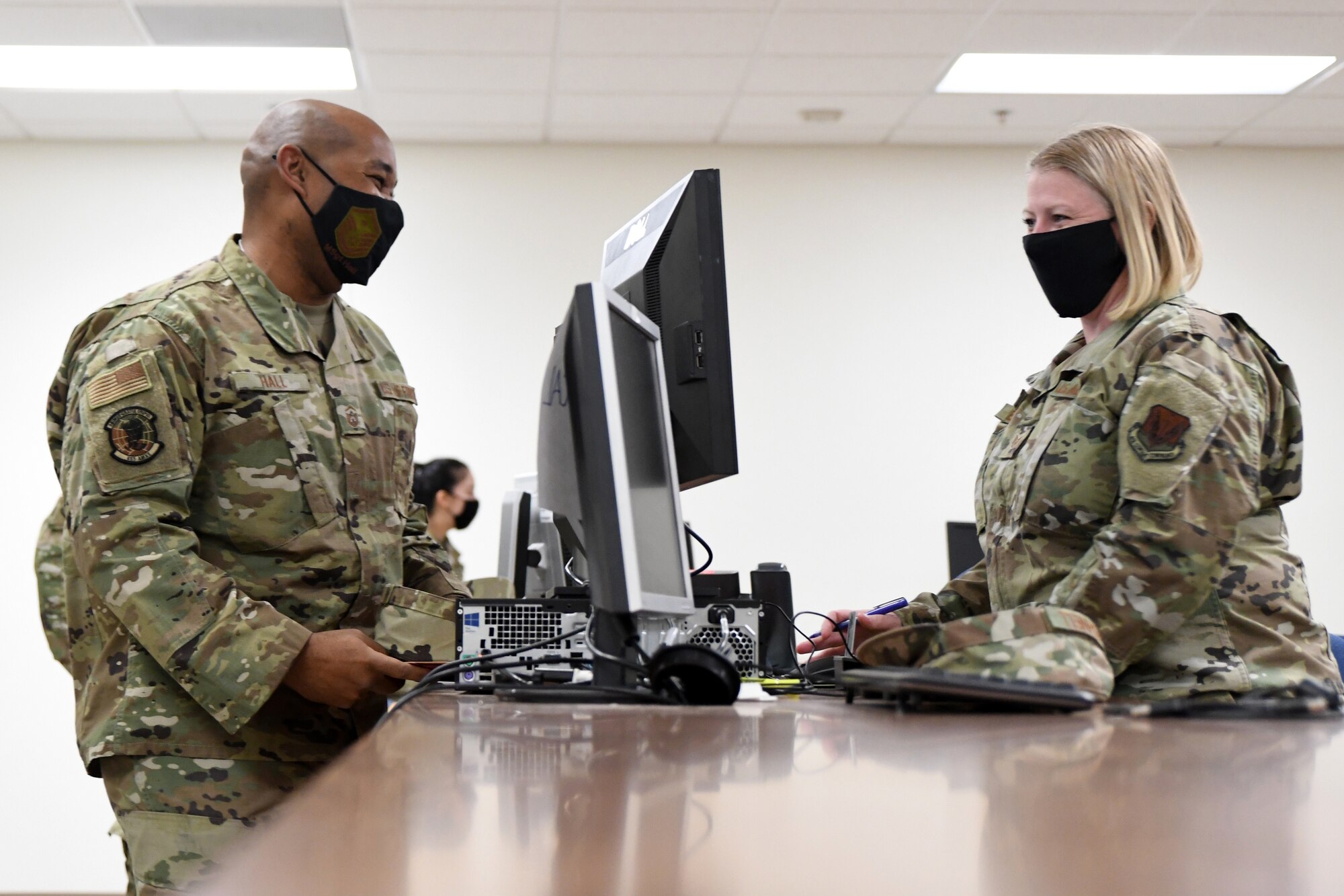 A photo of Airmen processing through a deployment line