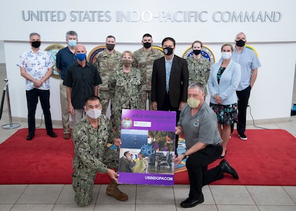 Participants of Exercise Able Resolve pose for a group photo Feb. 18, 2021, at the U.S. Indo-Pacific Command headquarters on Camp Smith, Hawaii. The exercise focused on biological-threat surveillance decision support and knowledge management.