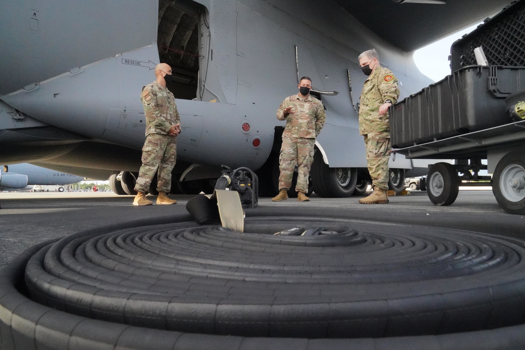 The Chairman of the Joint Chiefs of Staff U.S. Army Gen. Mark A. Milley speaks with members of the 15th Aircraft Maintenance Squadron at Hickam Field on Joint Base Pearl Harbor-Hickam, Hawaii, March 4, 2021.