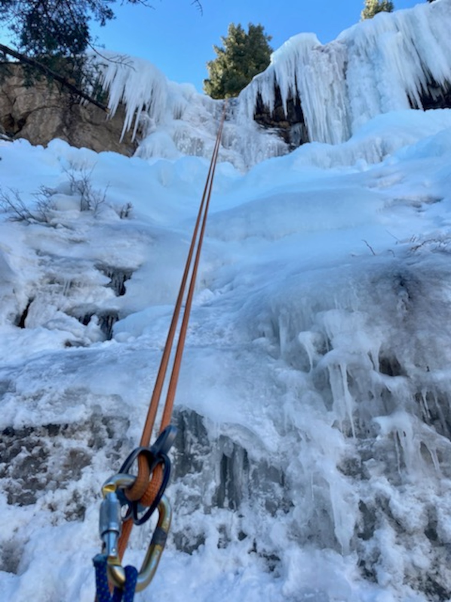 A rope harness is tested by a Special Warfare Pararescue (PJ) eight-man team from Kirtland AFB, who sprang into action to help rescue a civilian climber injured by falling rocks on January 7, 2021, in Ouray, CO.