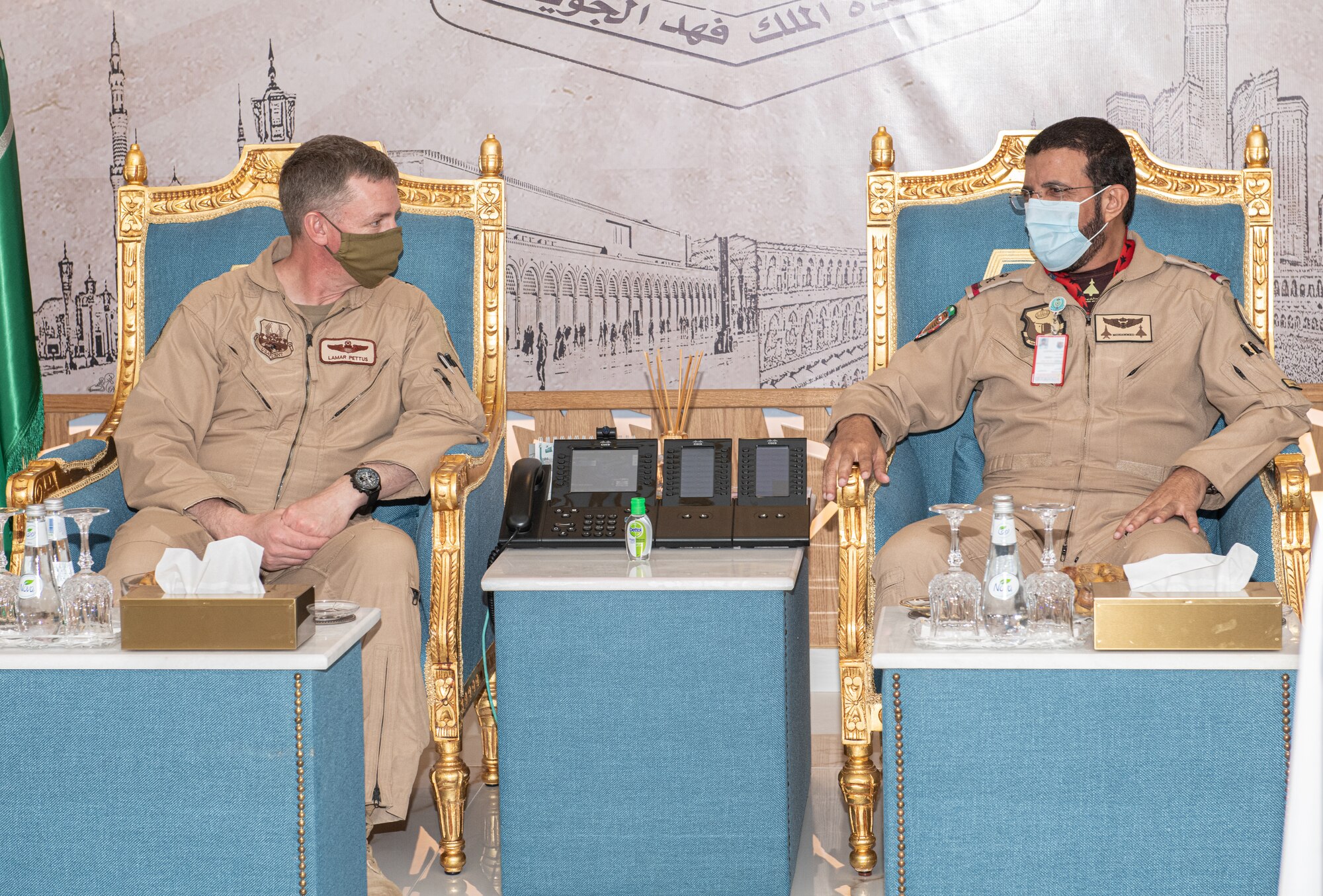 Brig. Gen. Evan Pettus, 378th Air Expeditionary Wing commander, speaks with the Royal Saudi Air Force King Fahad Air Base commander during an Agile Combat Employment capstone event Feb. 27, 2021, at an airbase in the Kingdom of Saudi Arabia.