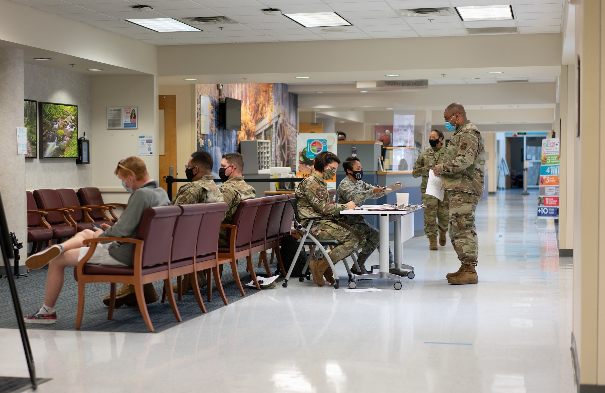 413th ASTS administers COVID vaccine