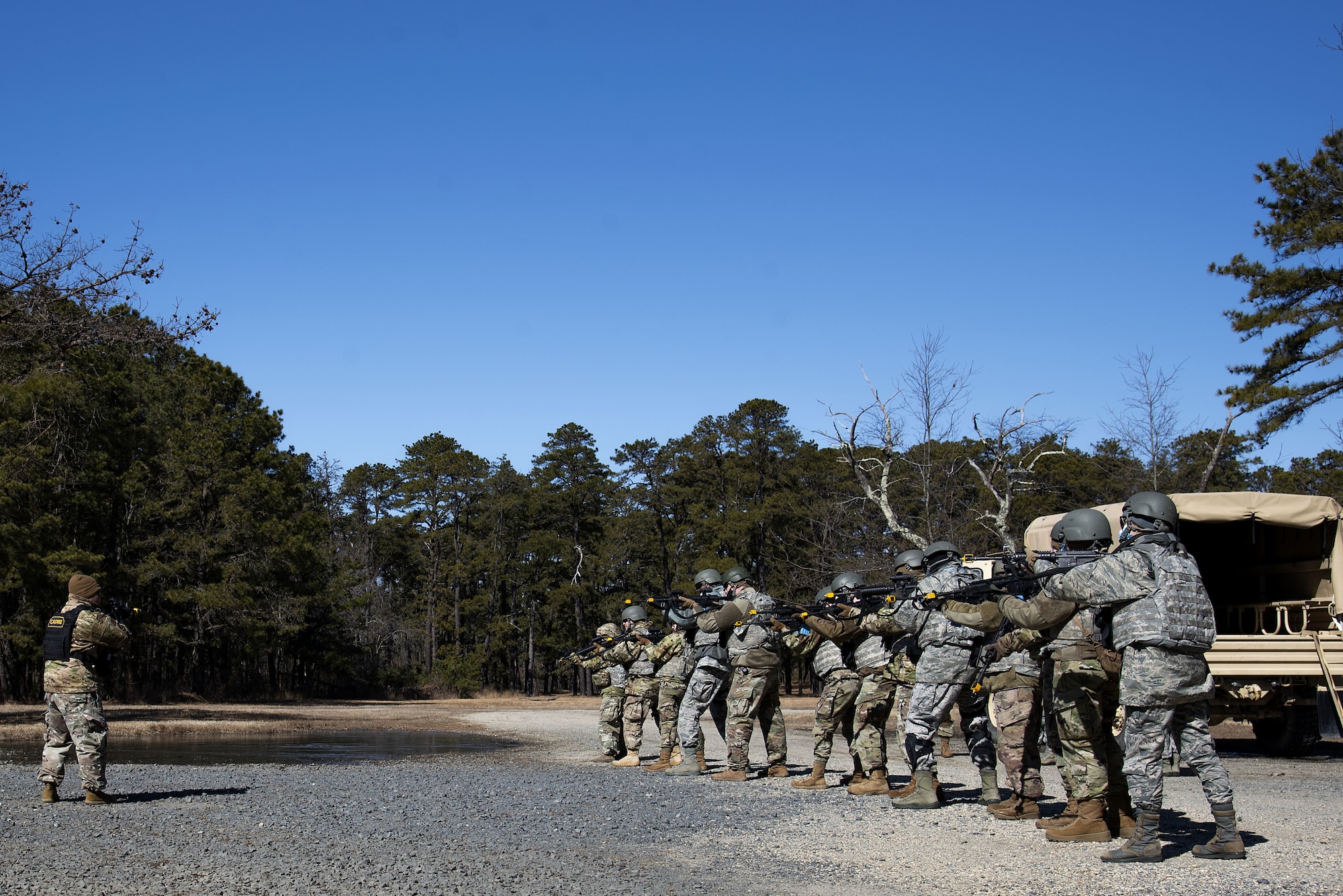 Photo of Airmen practicing weapons handling procedures during pre-deployment training.