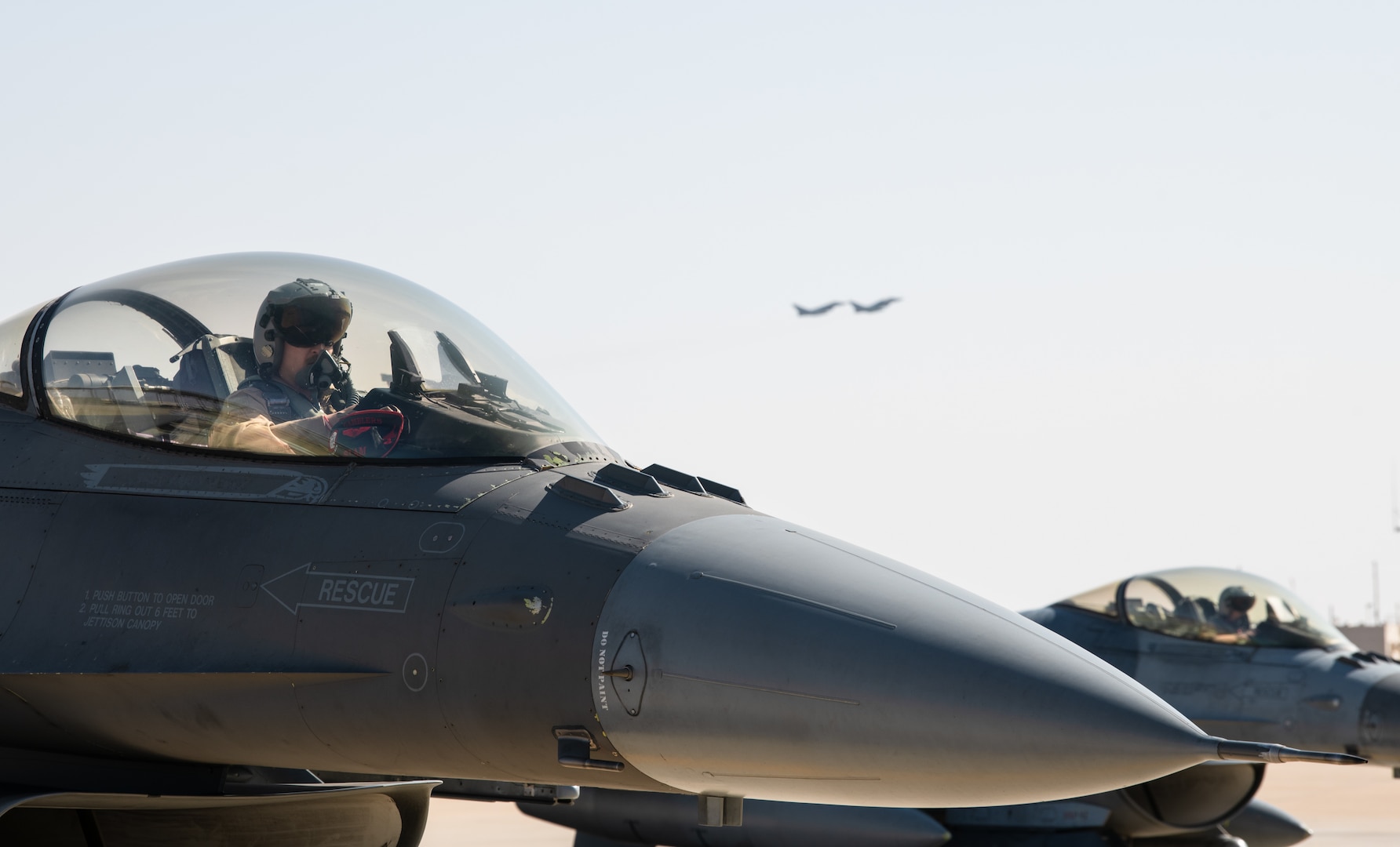 A pilot with the 77th Expeditionary Fighter Squadron pilot, prepares for flight during an Agile Combat Employment capstone event Feb. 27, 2021, at an airbase in the Kingdom of Saudi Arabia.