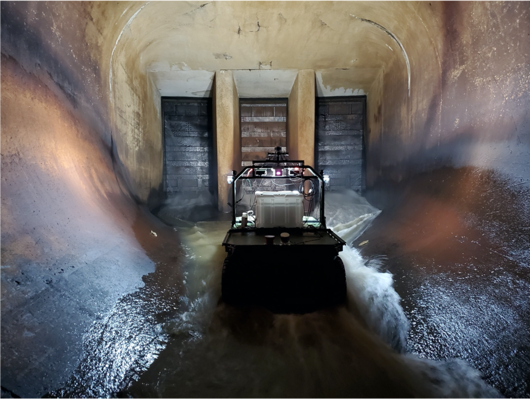 A robotic system known as the Dambot operates near closure gates at Blue Mountain Dam, Arkansas in October 2020. Dambot takes the human element out of a dangerous but necessary U.S. Army Corps of Engineers (USACE) maintenance task. The cutting-edge technology has  been successfully tested and stands poised to change the course of closure gate assessments, while also safeguarding USACE team members. (U.S. Army Corps of Engineers photo)