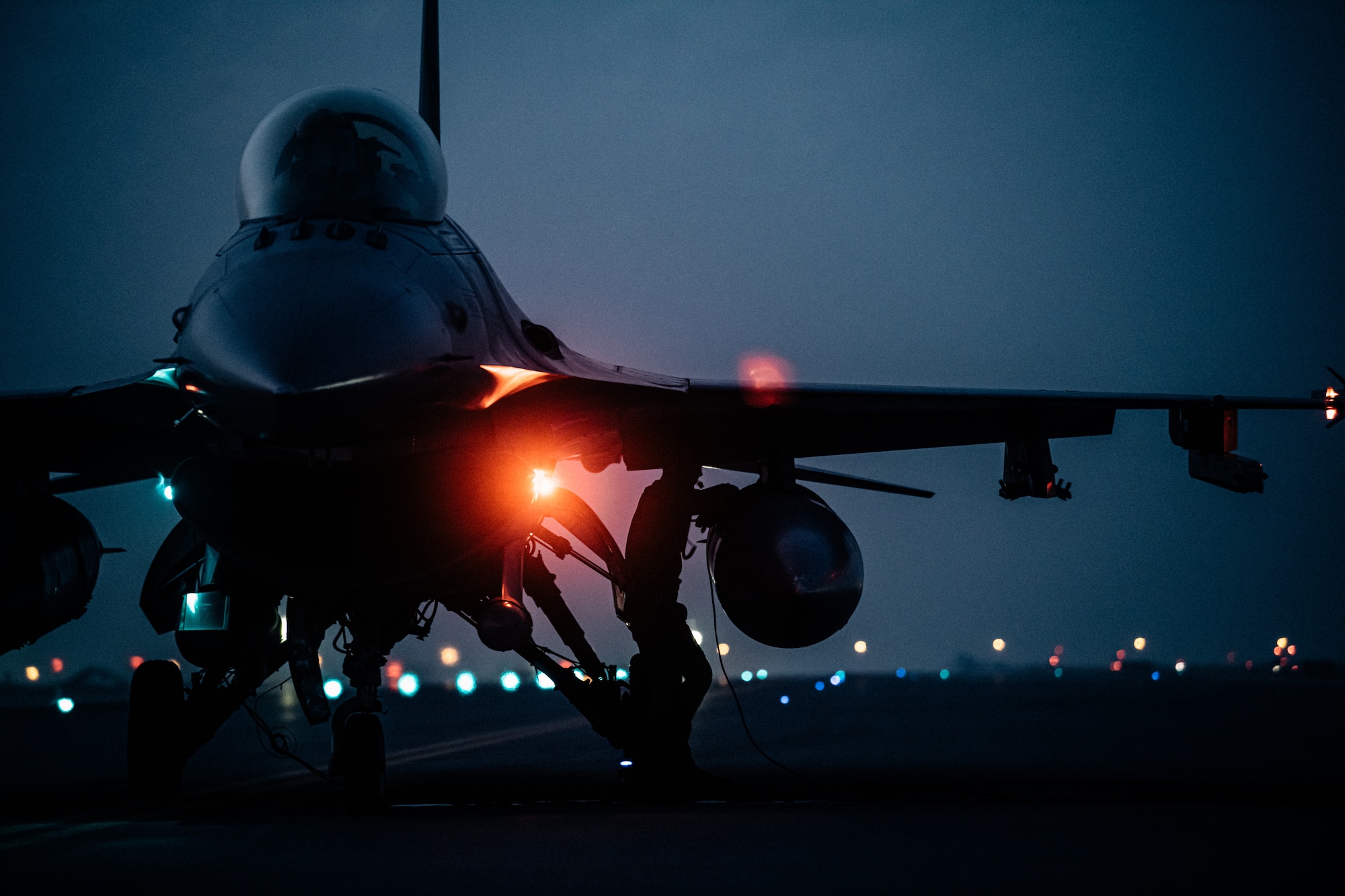 A U.S. Air Force F-16 Fighting Falcon aircraft assigned to the 77th Expeditionary Fighter Squadron at Prince Sultan Air Base, Kingdom of Saudi Arabia, undergoes a hot refueling operation performed by Airmen with the 379th Expeditionary Maintenance Group and 379th Expeditionary Logistics Readiness Squadron at Al Udeid Air Base, Qatar, Mar. 1, 2021. F-16s received fuel with their engines still running in order to rapidly redeploy back into U.S. Central Command’s area of responsibility during an Air Forces Central Agile Combat Employment capstone event. The capstone event enhanced theater ACE competencies, validating operational capabilities and command and control while simultaneously strengthening joint and regional partnerships.