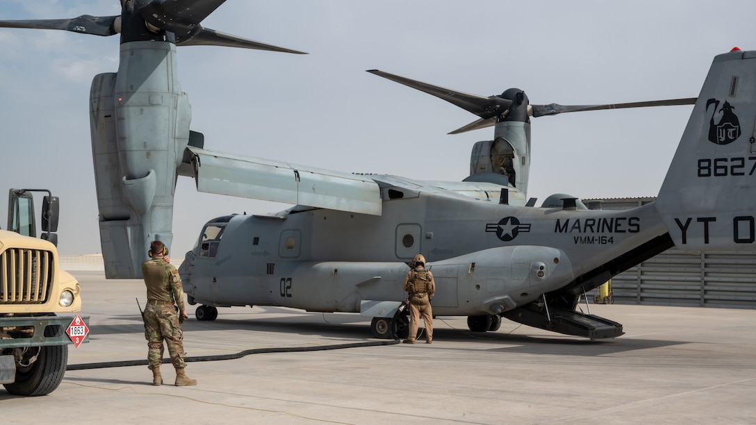 A U.S. Marine Corps MV-22 Osprey aircraft, attached to Marine Medium Tiltrotor Squadron 164 (Reinforced), 15th Marine Expeditionary Unit, undergoes refueling operations during an Air Forces Central Agile Combat Employment Capstone event at Al Udeid Air Base, Qatar, March 2, 2021. Integration of sister service airframes allowed Al Udeid AB Airmen to hone their skills to be prepared for any mission crucial to U.S. Central Command’s area of responsibility.