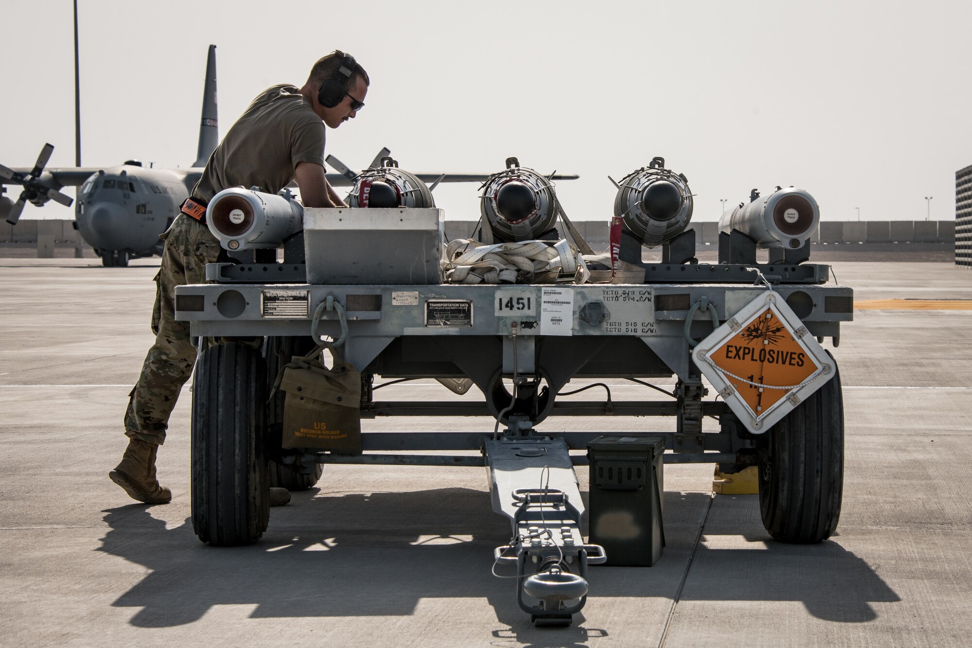 airman checking munitions