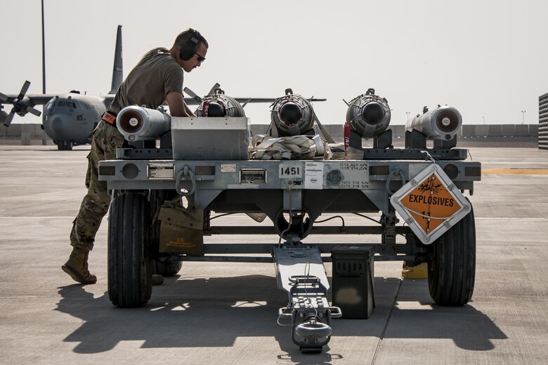airman checking munitions
