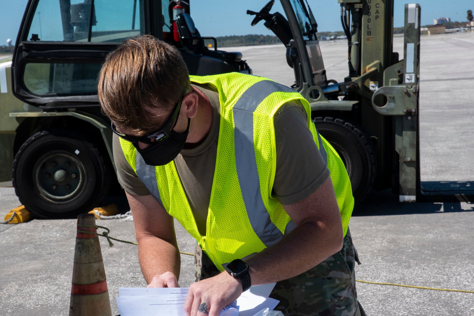 U.S. Air Force Senior Airman Russel Iverson, 6th Logistics Readiness Squadron fleet management and analysis technician, checks an inventory list during an exercise, March 4, 2021, at MacDill Air Force Base, Fla.