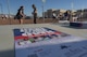 Nellis Air Force Assistance Fund 5k Color Run poster on a  table