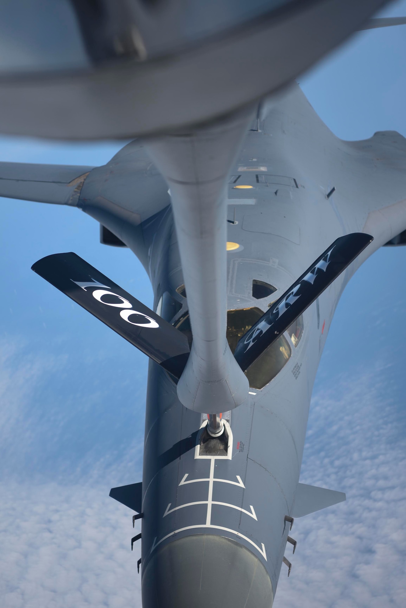 A U.S. Air Force B-1B Lancer aircraft, assigned to the 7th Bomb Wing, Dyess Air Force Base, Texas, receives fuel from a KC-135 Stratotanker aircraft assigned to the 100th Air Refueling Wing, Royal Air Force Mildenhall, England, during a Bomber Task Force mission over the North Sea, March 3, 2021. RAF Mildenhall’s KC-135s enable the rapid response of U.S. bombers across Europe and Africa. (U.S. Air Force photo by Senior Airman Joseph Barron)