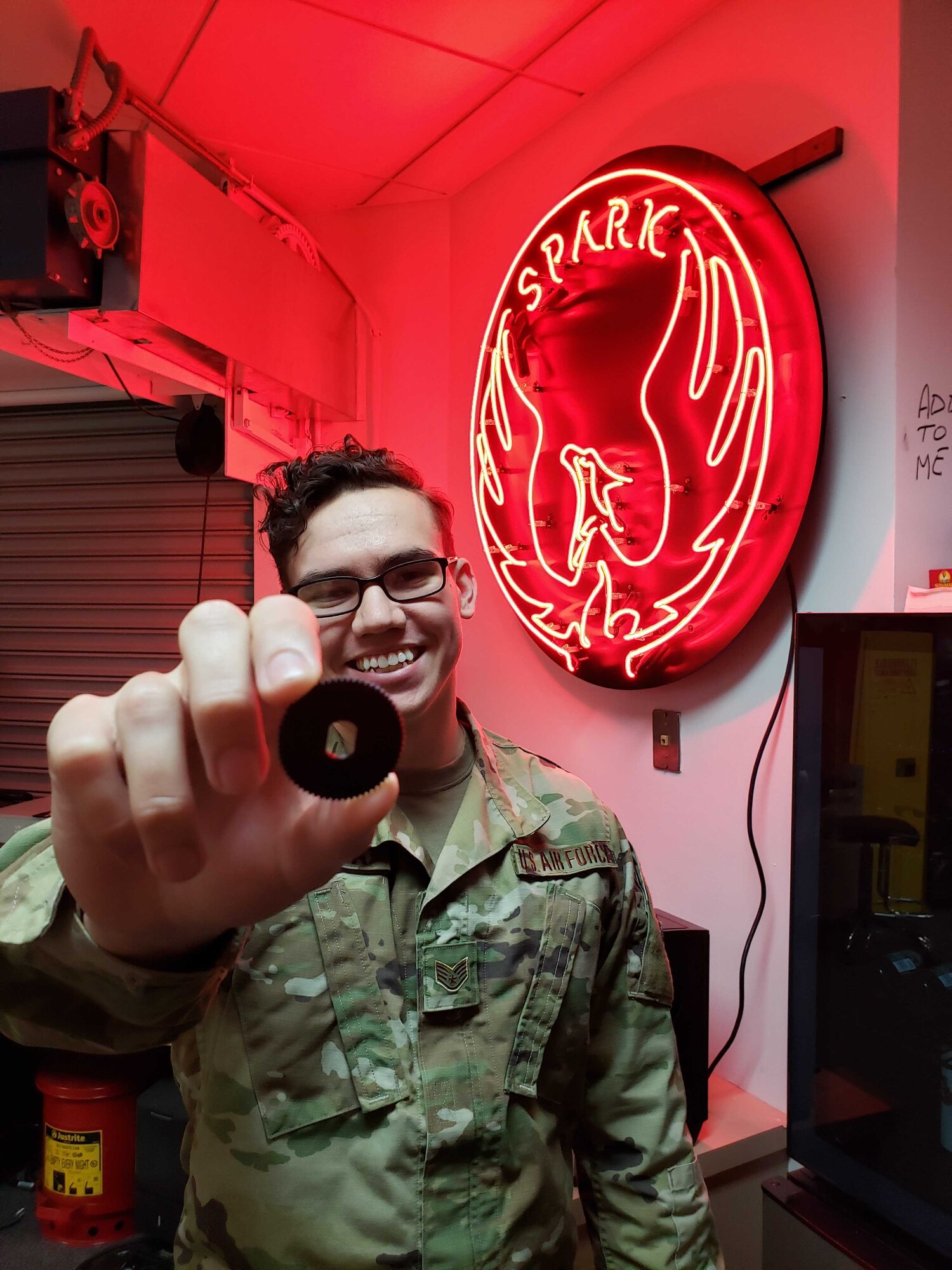man creates plastic piece to fix firetruck