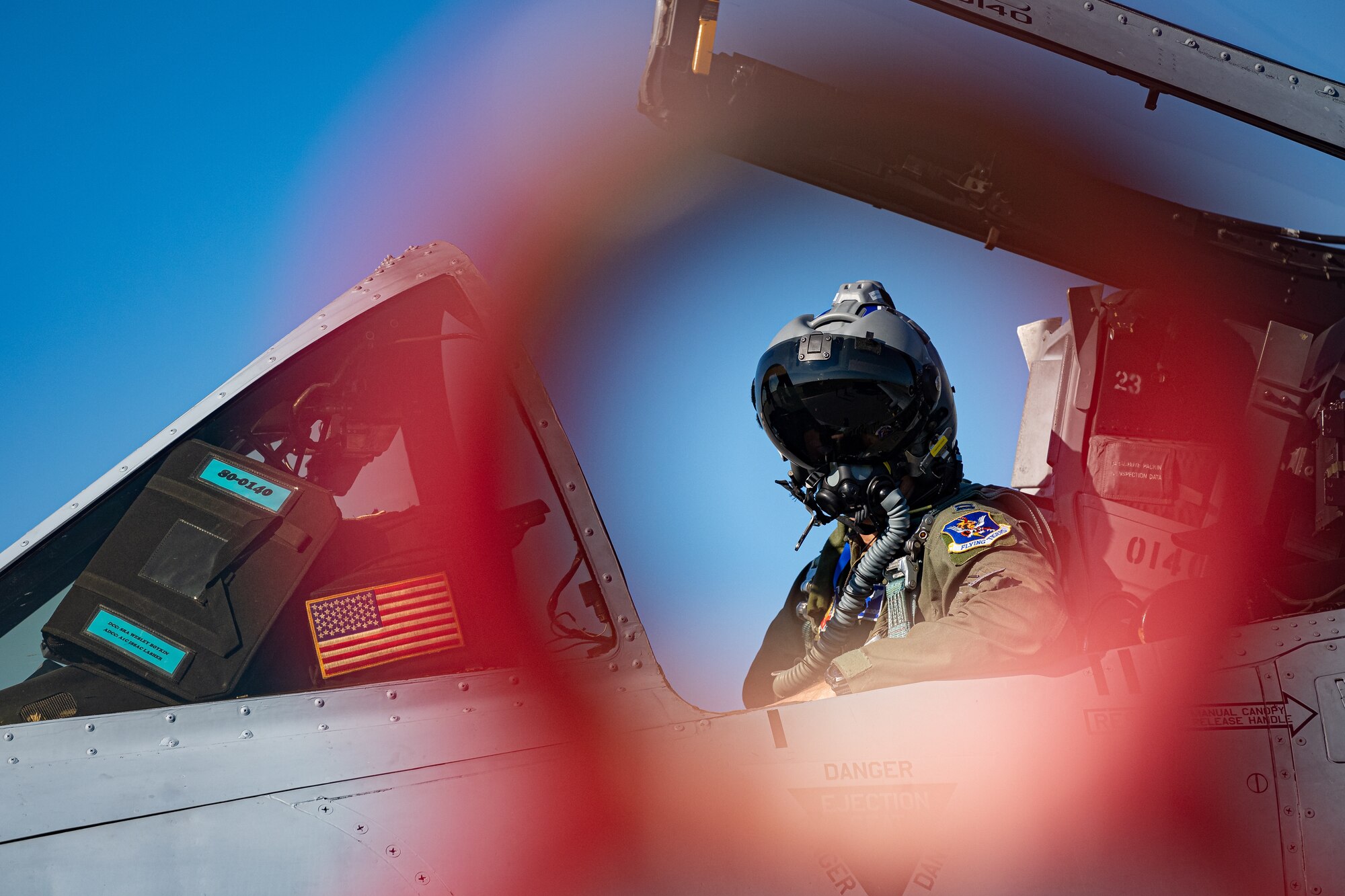 A photo of a pilot in an A-10C Thunderbolt II