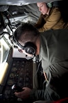 U.S. Air Force Master Sgt. Robert Winovich, a boom operator assigned to the 171st Air Refueling Wing, Pennsylvania Air National Guard, refuels a U.S. Navy E-2D Advanced Hawkeye aircraft assigned to Aircraft Command and Control Squadron (VAW) 126 Seahawks, near the East Coast, Feb. 4, 2021.
