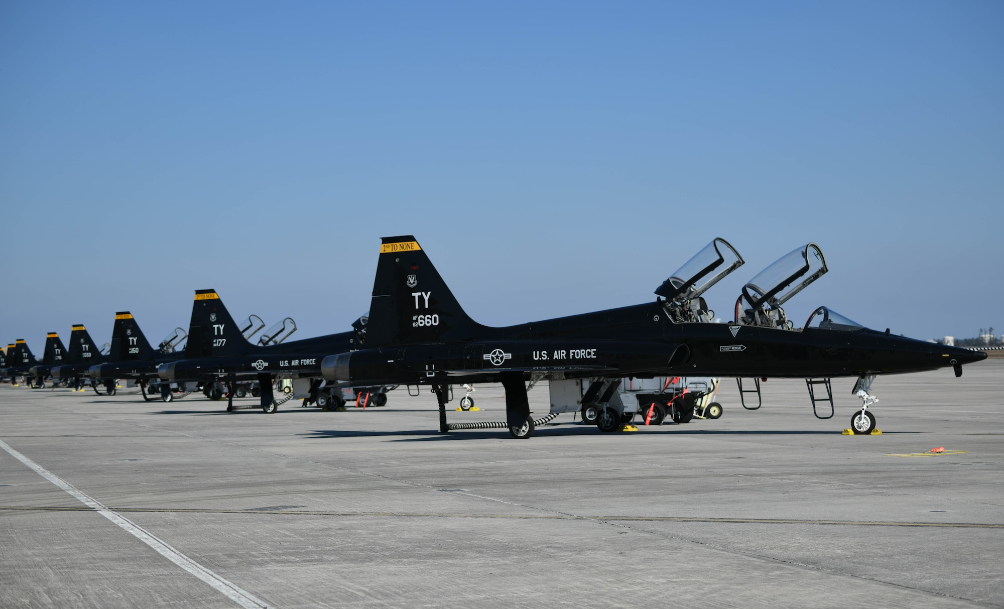 A row of T-38 Talons sit at Tyndall Air Force Base