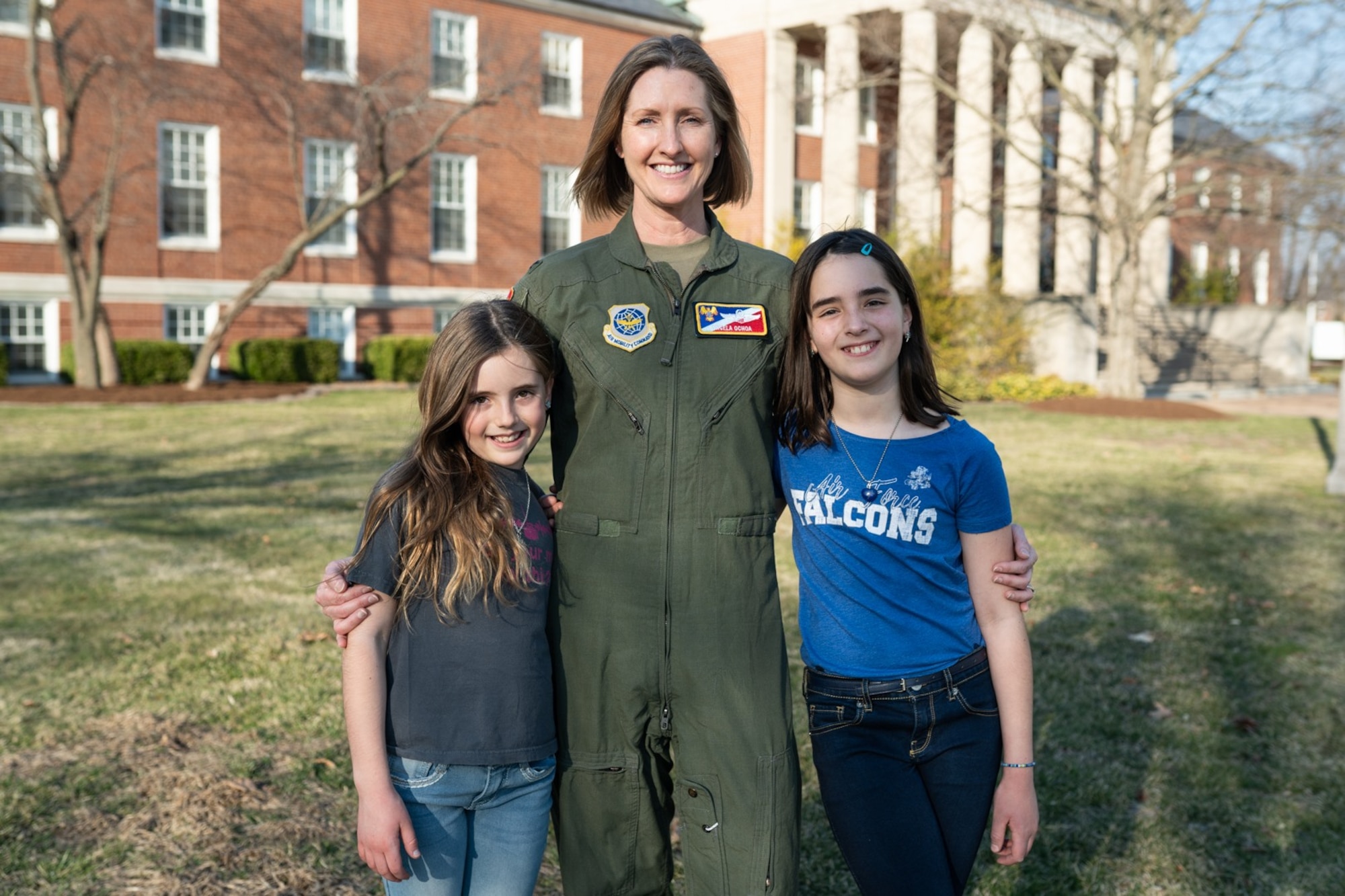 Col. Angela Ochoa, 375th Air Mobility Wing vice commander, gives some counsel to her two daughters, Elsa and Seanna, about how to courageously lead based on some of her experiences she has had while in the Air Force. (USAF Photo by 1st. Lt. Sam Eckholm)