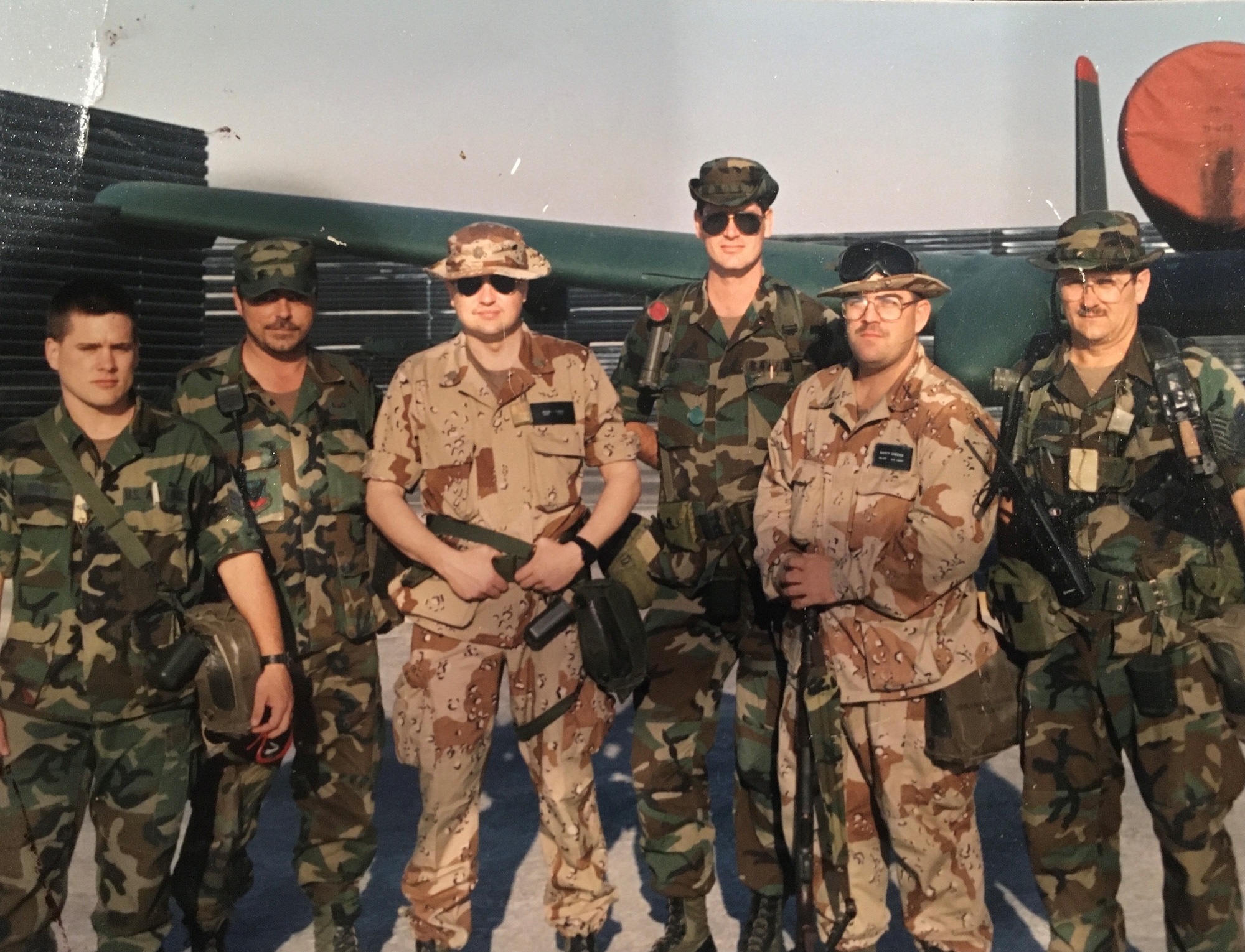 Lt. Col. William Short, (far left) poses for a photo, June 1990, while deployed in support of Operation Desert Shield in Saudi Arabia. Short, then an Air Force staff sergeant, was one of 697,000 U.S. troops to participate in the operation. (Courtesy photo)