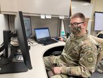 Sgt. Millard “Robbie” Stickler, Non-Commissioned Officer in Charge (NCOIC) of Task Force Chemical, Biological, Radiological, Nuclear, and High Yield Explosive Response Enterprise (TF-CRE) for the West Virginia National Guard COVID-19 response efforts poses for photos at the Joint Interagency Task Force for COVID-19 Vaccines in Charleston, West Virginia, Mar. 8, 2021. Stickler has been on COVID-19 response orders since March of 2020 performing multiple assignments including decontamination missions, COVID-19 testing site management, and taking care of Soldier travel throughout the Mountain State. (U.S. Army National Guard photo by Spc. Meg Keller)