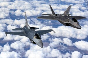 Pilots with the F-16 Viper and F-22 Raptor Demonstration Teams fly behind a KC-135 Stratotanker from the 465th Air Refueling Squadron assigned to Tinker Air Force Base, Oklahoma March 8, 2021. The F-16 team from Shaw Air Force Base, South Carolina, and the F-22 team from Joint Base Langley–Eustis, Virginia, are assigned to Air Combat Command and received fuel from the Okies during their flight back to their home stations after performing at an air show. (U.S. Air Force photo by Senior Airman Mary Begy)