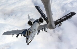 An A-10 Thunderbolt II from the 75th Fighter Squadron, Moody Air Force Base, Georgia, refuels from a KC-135 Stratotanker from 465th Air Refueling Squadron, Tinker Air Force Base, Oklahoma, on their way to Red Flag March 5, 2021. Refueling with the Okies allowed the A-10s to make it to the exercise without having to land. (U.S. Air Force Base photo by Senior Airman Mary Begy)