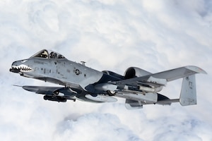 An A-10 Thunderbolt II from the 75th Fighter Squadron, Moody Air Force Base, Georgia, refuels from a KC-135 Stratotanker from 465th Air Refueling Squadron, Tinker Air Force Base, Oklahoma, on their way to Red Flag March 5, 2021. Refueling with the Okies allowed the A-10s to make it to the exercise without having to land. (U.S. Air Force Base photo by Senior Airman Mary Begy)