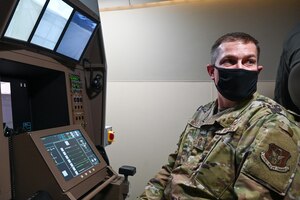 Chief Master Sgt. Steven Nicholas, 507th Air Refueling Wing command chief,  learns about the KC-46 Boom Operator Weapons System Trainer March 3, 2021, at Altus Air Force Base, Oklahoma. (U.S. Air Force photo by Senior Airman Mary Begy)