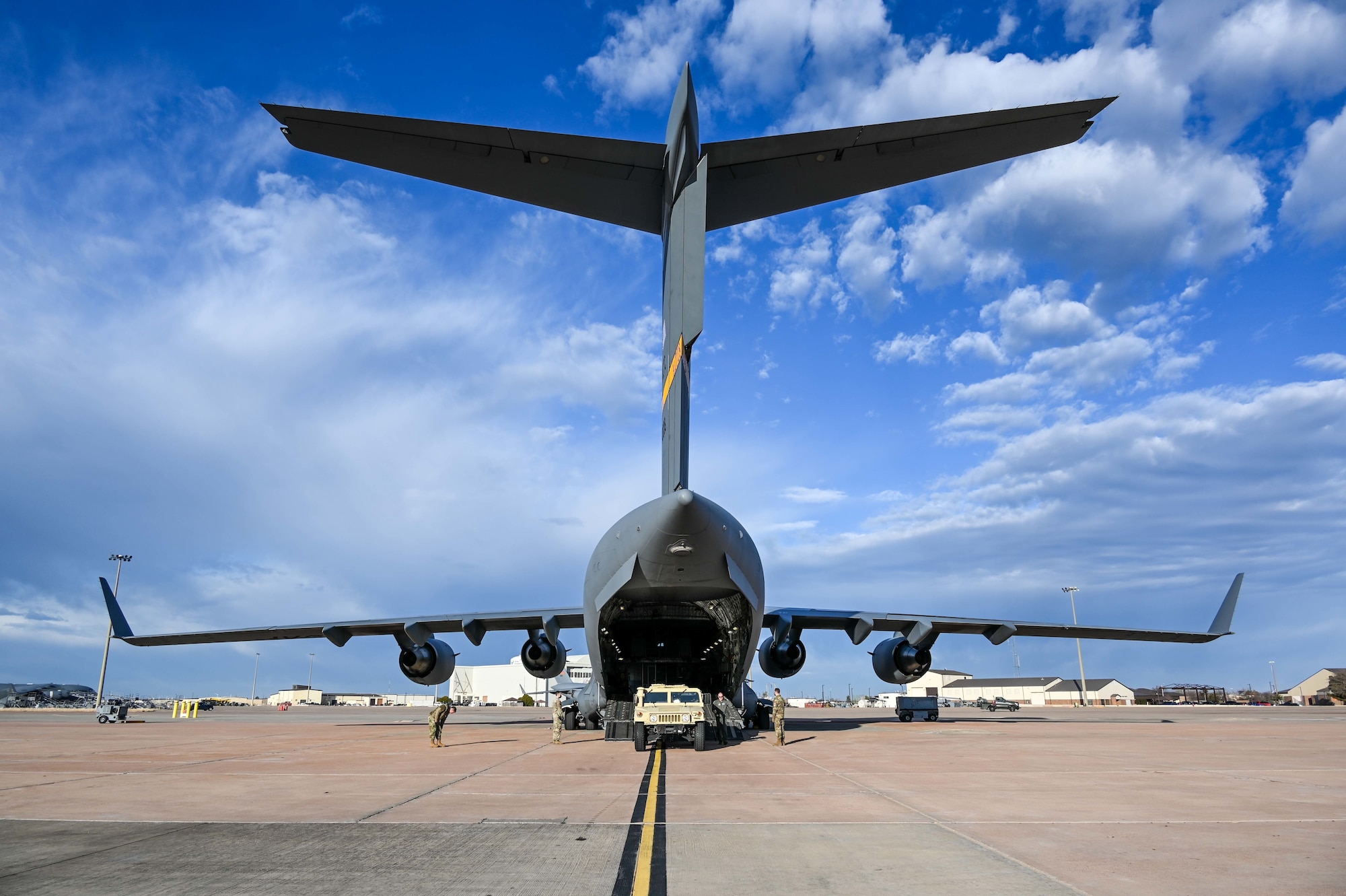 Reservists from the 730th Air Mobility Training Squadron, Altus Air Force Base, Oklahoma, prepare for a training sortie March 4, 2021. The 730th AMTS is a geographically separated unit of the 507th Operations Group, Tinker Air Force Base, Oklahoma, whose mission is to train future KC-135, KC-46 and C-17 pilots, KC-135 and KC-46 boom operators, and C-17 loadmasters. (U.S. Air Force photo by Senior Airman Mary Begy)