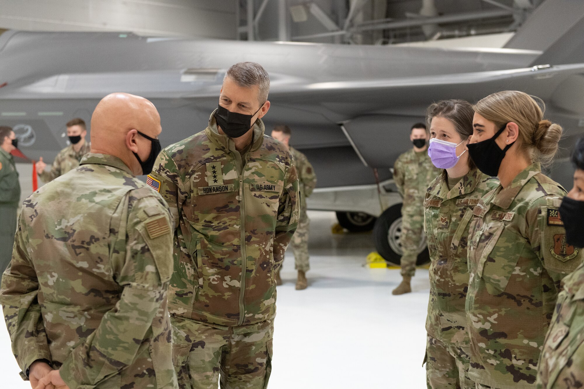 U.S. Army General Daniel R. Hokanson, chief, National Guard Bureau, speaks with Chief Master Sgt. Winger at the Vermont Air National Guard Base.