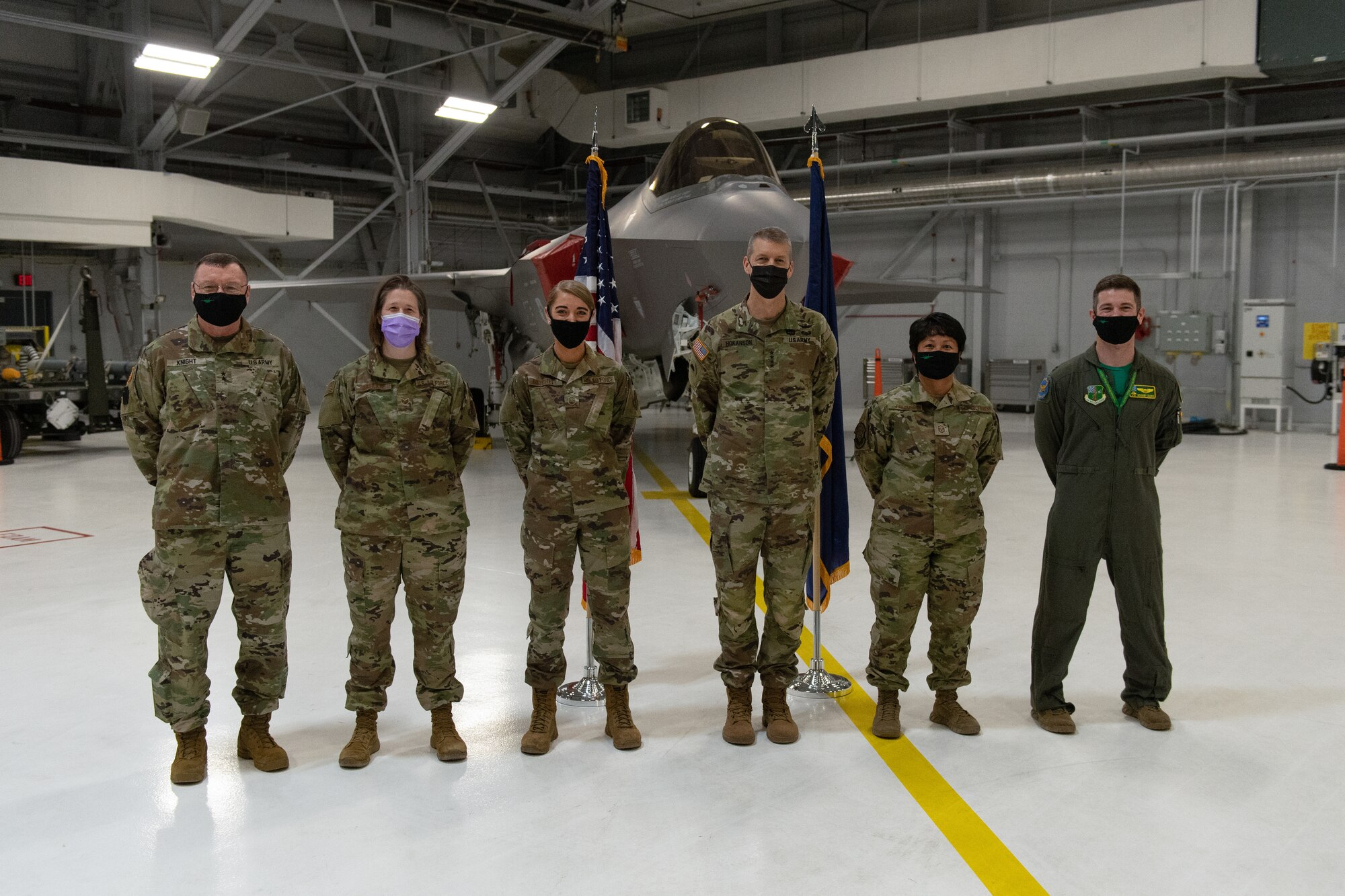 U.S. Army General Daniel R. Hokanson, chief, National Guard Bureau, stands for a portrait with Vermont’s adjutant general, U.S. Army Maj. Gen. Gregory Knight, and outstanding Airmen assigned to the 158th Fighter Wing.