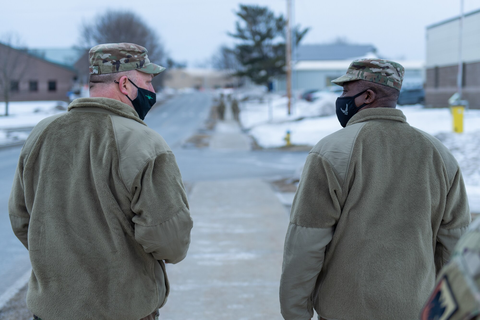 U.S. Air Force Chief Master Sgt. Maurice L. Williams, command chief, Air National Guard (ANG), speaks with Chief Master Sgt. Jeffrey Stebbins, command chief, 158th Fighter Wing.