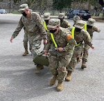 Advanced Individual Training Soldiers assigned to the U.S. Army Medical Center of Excellence demonstrate use of the sked and litter carries during patient evacuation during Soldier in Transition Training, or SiTT, at Joint Base San Antonio-Fort Sam Houston last month.