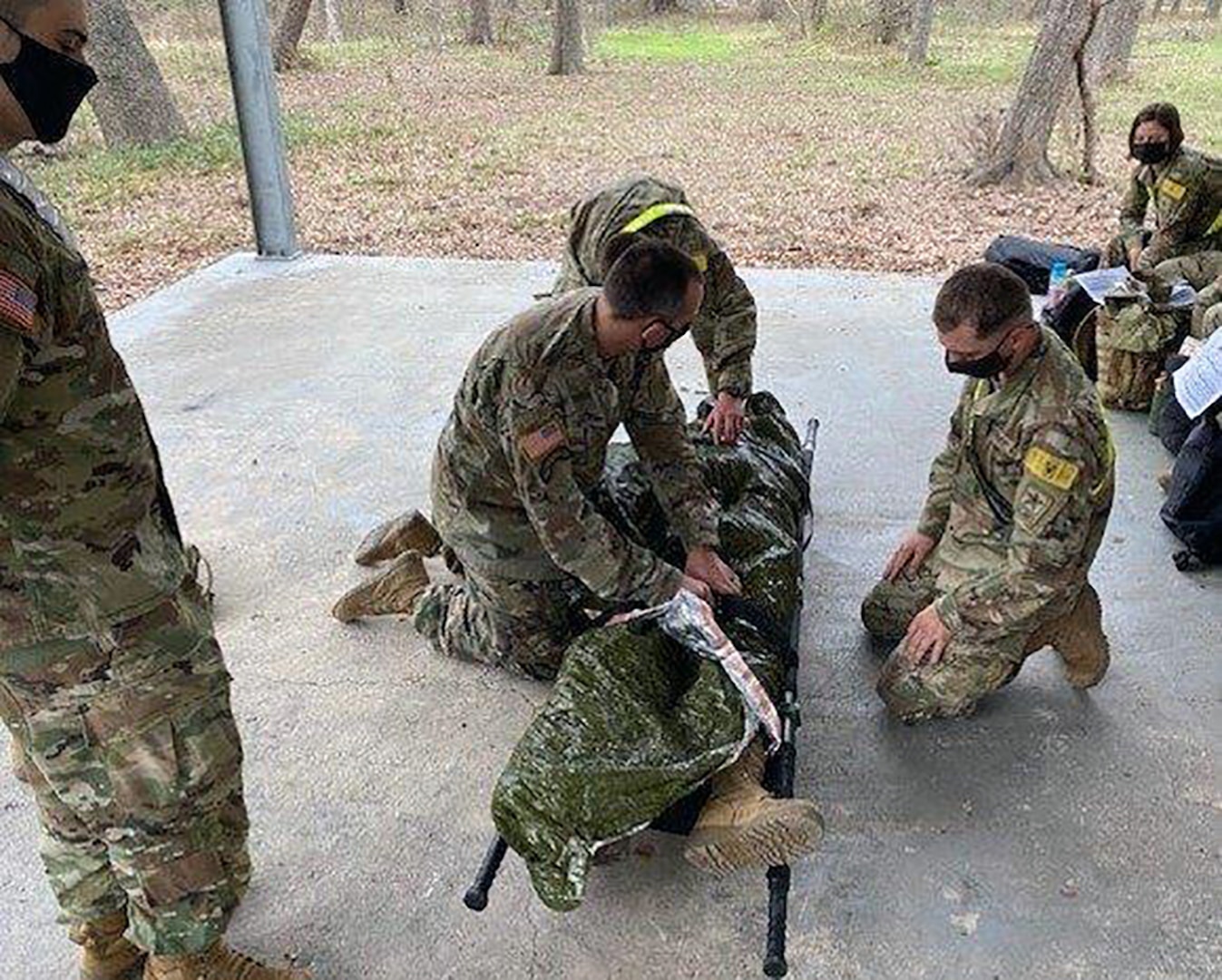 Advanced Individual Training Soldiers assigned to the U.S. Army Medical Center of Excellence demonstrate use of the sked and litter carries during patient evacuation during Soldier in Transition Training, or SiTT, at Joint Base San Antonio-Fort Sam Houston last month.