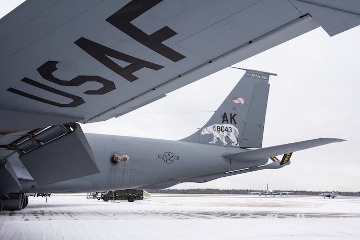 A KC-135 Stratotanker from the Alaska Air National Guard’s 168th Wing was unveiled showcasing a new tail flash on the wing’s aircraft, Oct. 15, 2020. A polar bear stands strong on the wing’s tail flash representing the arctic region and spirit of Alaska. The geometric design of the polar bear highlights the wing’s culture of innovation. The 168th Wing continues to have strong ties to local communities in interior Alaska as the “hometown Air Force.” In collaboration with Tanana Chiefs Conference, the 168th Wing honors interior communities on the wing’s aircraft. The first KC-135 revealed honors Minto and is one of nine total aircraft representing Alaska interior communities. The next aircraft to be unveiled will honor Gwichyaa Zhee, Grayling, Huslia, Tetlin, Telida, and Tanana. Additionally, Fairbanks and North Pole will be displayed on the final two aircraft. (U.S. Air National Guard photo by Senior Master Sgt. Julie Avey)