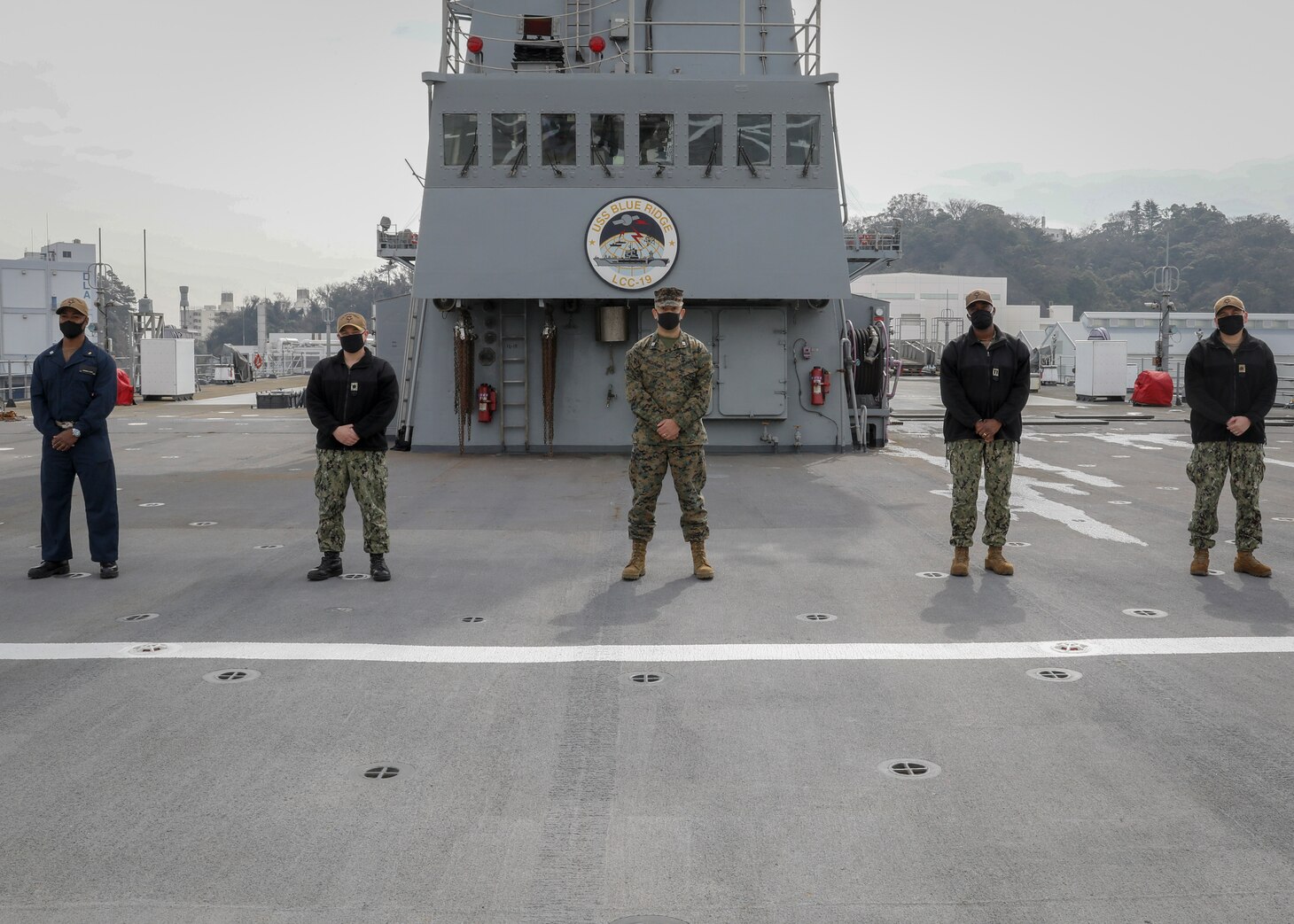 210305-N-MM501-1004 YOKOSUKA, Japan (March 5, 2021) – Marines, assigned to III Marine Expeditionary Force (MEF) from Okinawa, Japan, and Sailors, assigned to U.S. 7th Fleet in Yokosuka, Japan, work side by side in support of a ten-week integration with U.S. 7th Fleet and III MEF. The focus of the integration is to ensure the U.S. Navy and Marine Corps aligns with the National Defense Strategy. U.S. 7th Fleet routinely operates and interacts with 35 maritime nations while conducting missions to preserve and protect a free and open Indo-Pacific Region. (U.S. Navy photo by Mass Communication Specialist 2nd Class Shannon Burns)
