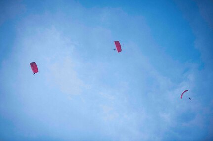 Members of the Special Warfare Training Wing parachute over Airmen’s Heritage Park during a Medal of Honor plaque unveiling ceremony to honor Master Sgt. John Chapman at Joint Base San Antonio-Randolph March 4, 2021.