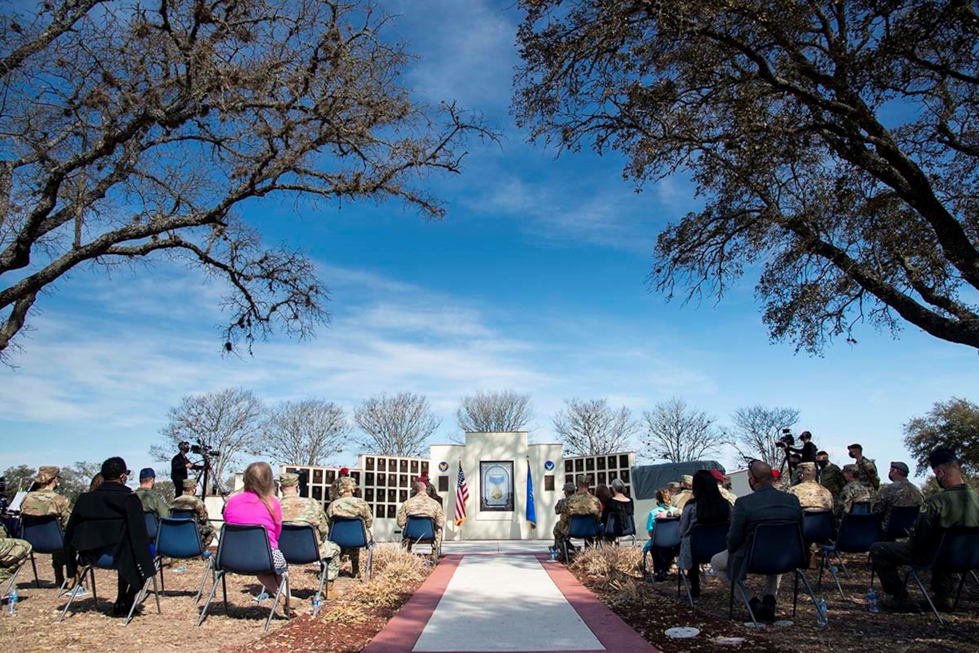 Members of the Joint Base San Antonio and the Special Warfare Training Wing come together to honor Medal of Honor recipient Master Sgt. John Chapman during a Medal of Honor plaque unveiling ceremony at Airmen’s Heritage Park at Joint Base San Antonio-Randolph March 4, 2021.