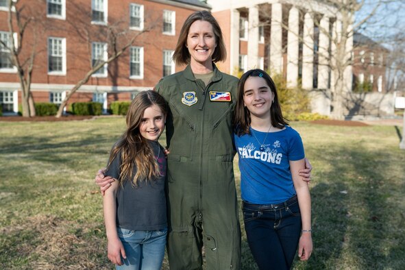 Col. Angela Ochoa, 375th Air Mobility Wing vice commander, gives some counsel to her two daughters, Elsa and Seanna, about how to courageously lead based on some of her experiences she has had while in the Air Force. (USAF Photo by 1st. Lt. Sam Eckholm)