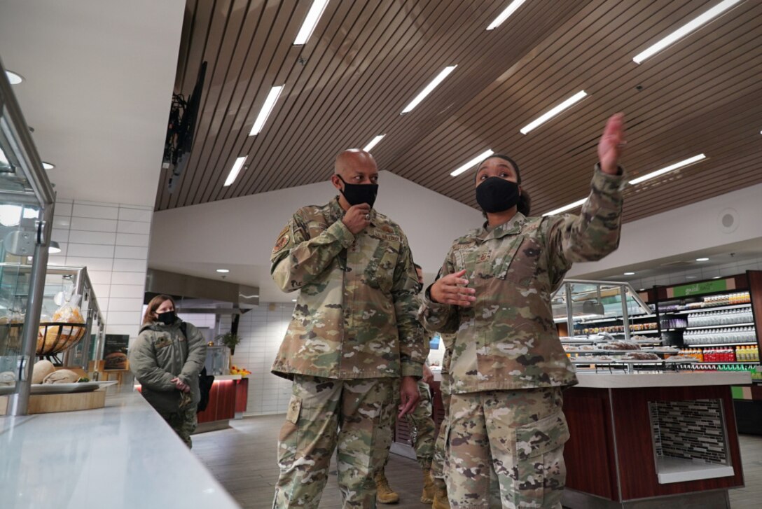 Air Force Chief of Staff Charles Q. Brown, Jr. is briefed by Senior Master Sgt. LaShonna Wooten, 319th Force Support Squadron sustainment services flight superintendent about changes to the Airey Dining Facility following its Food 2.0 initiative in 2018 at Grand Forks Air Force Base, N.D., Feb. 17, 2021. The Food 2.0 initiative included cosmetic structural upgrades to the DFAC, as well as a multitude of newer and healthier food choices for Airmen. (U.S. Air Force photo by Staff Sgt. Elora J. McCutcheon)