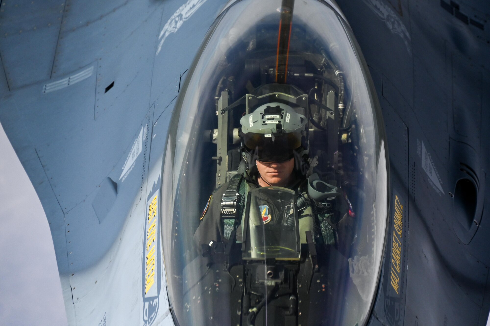 An F-16 Viper Demonstration Team pilot refuels with a KC-135 Stratotanker from the 465th Air Refueling Squadron assigned to Tinker Air Force Base, Oklahoma, March 8, 2021. The F-16 team from Shaw Air Force Base, South Carolina, is assigned to Air Combat Command received fuel from the Okies during their flight back to their home station after performing at an air show. (U.S. Air Force photo by Senior Airman Mary Begy)
