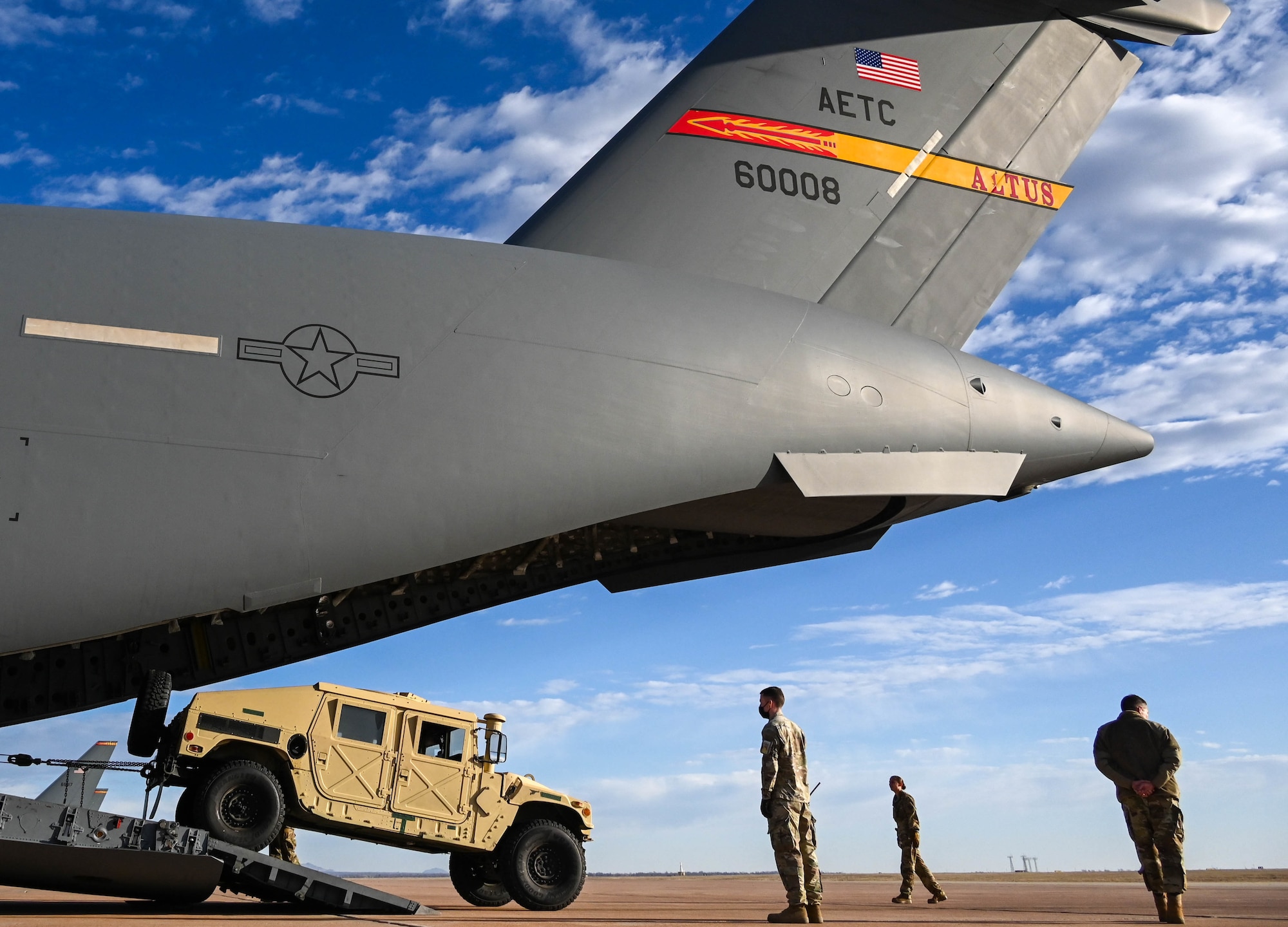Reservists from the 730th Air Mobility Training Squadron, Altus Air Force Base, Oklahoma, prepare for a training sortie March 4, 2021. The 730th AMTS is a geographically separated unit of the 507th Operations Group, Tinker Air Force Base, Oklahoma, whose mission is to train future KC-135, KC-46 and C-17 pilots, KC-135 and KC-46 boom operators, and C-17 loadmasters. (U.S. Air Force photo by Senior Airman Mary Begy)
