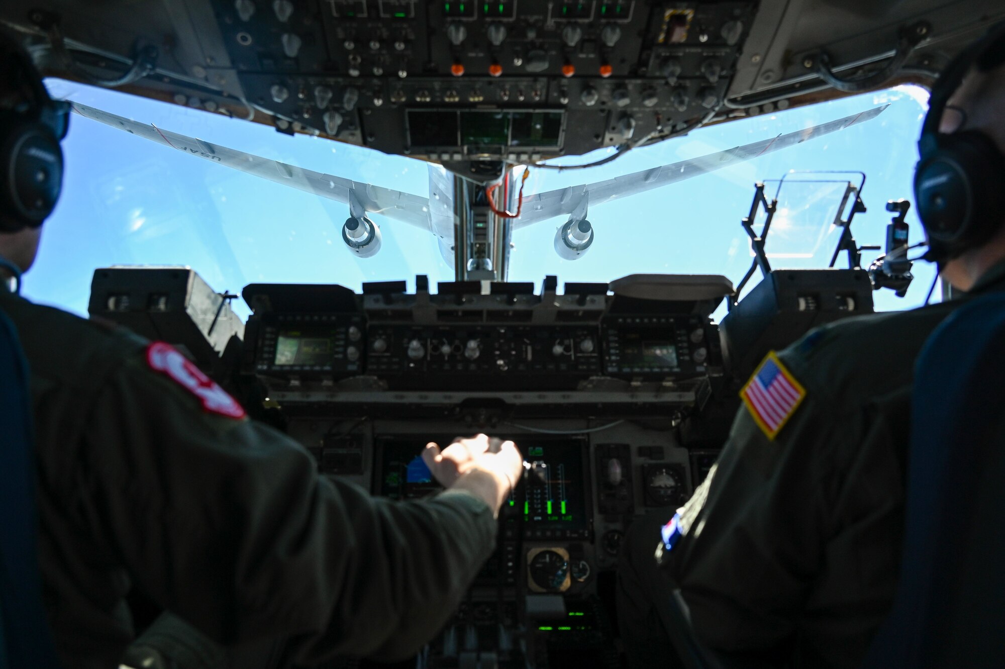 A C-17 Globemaster flown by the 730th Air Mobility Training Squadron, Altus Air Force Base, Oklahoma refuels with a KC-46 Pegasus March 4, 2021. (U.S. Air Force photo by Senior Airman Mary Begy)