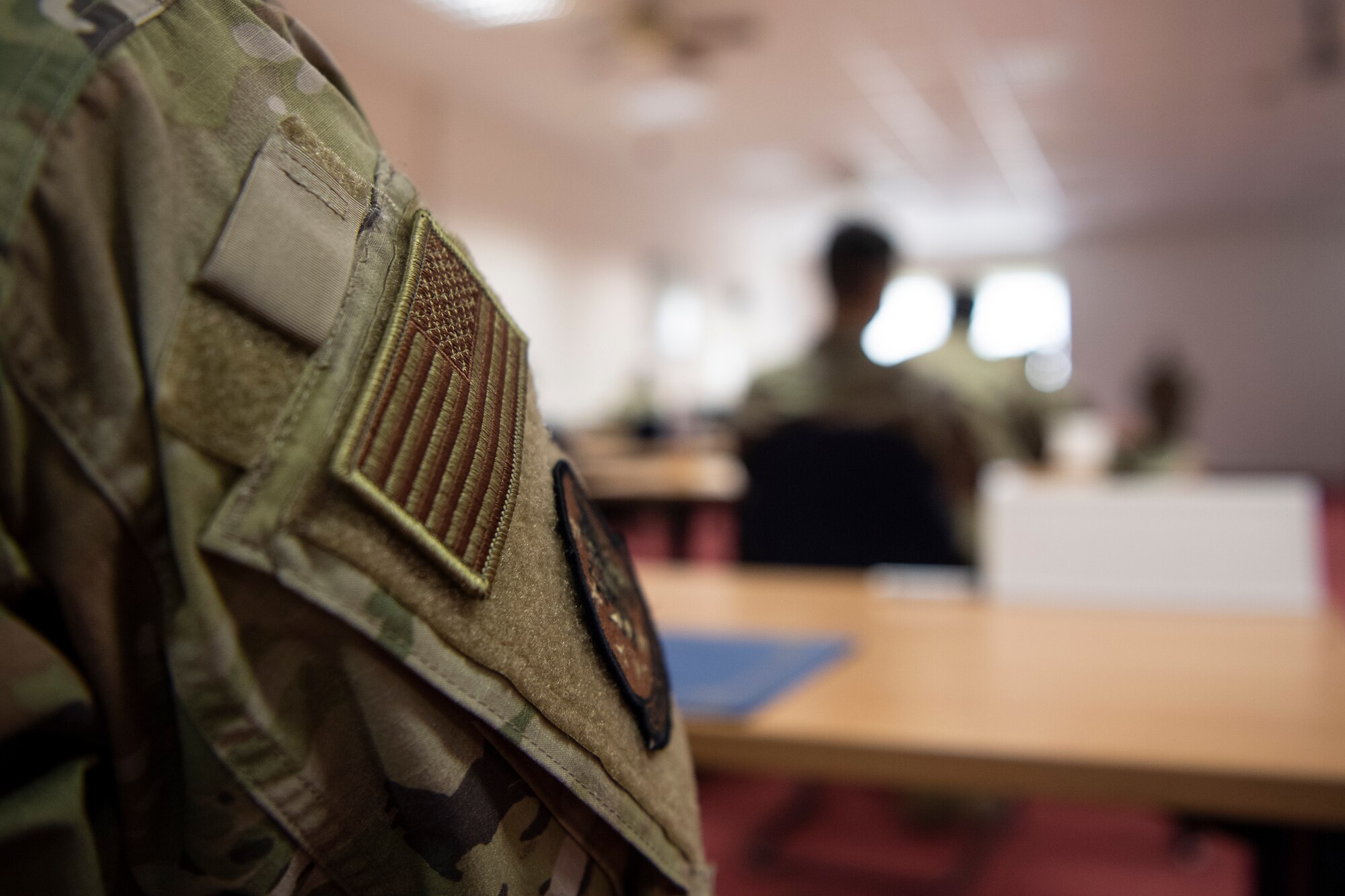 U.S. Air Force Airmen attending the 52nd Fighter Wing’s first NCO professional development seminar of the year listen as U.S. Air Force Chief Master Sgt. Stephanie Cates, 52nd FW command chief, gives closing comments in the Saber Conference Center on Spangdahlem Air Base, Germany, March 5, 2021.