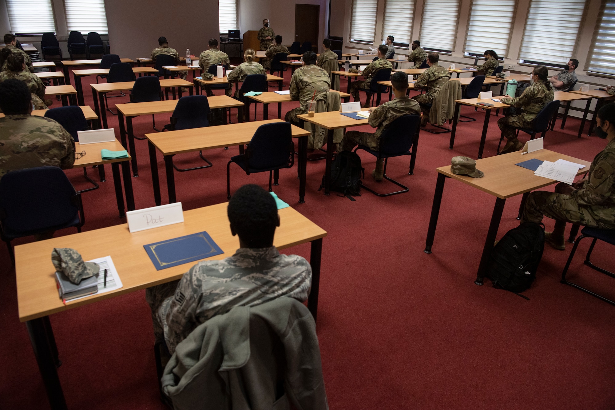 U.S. Air Force Airmen attending the 52nd Fighter Wing’s first NCO professional development seminar of the year listen as U.S. Air Force Chief Master Sgt. Stephanie Cates, 52nd FW command chief, gives closing comments in the Saber Conference Center at Spangdahlem Air Base, Germany, March 5, 2021.