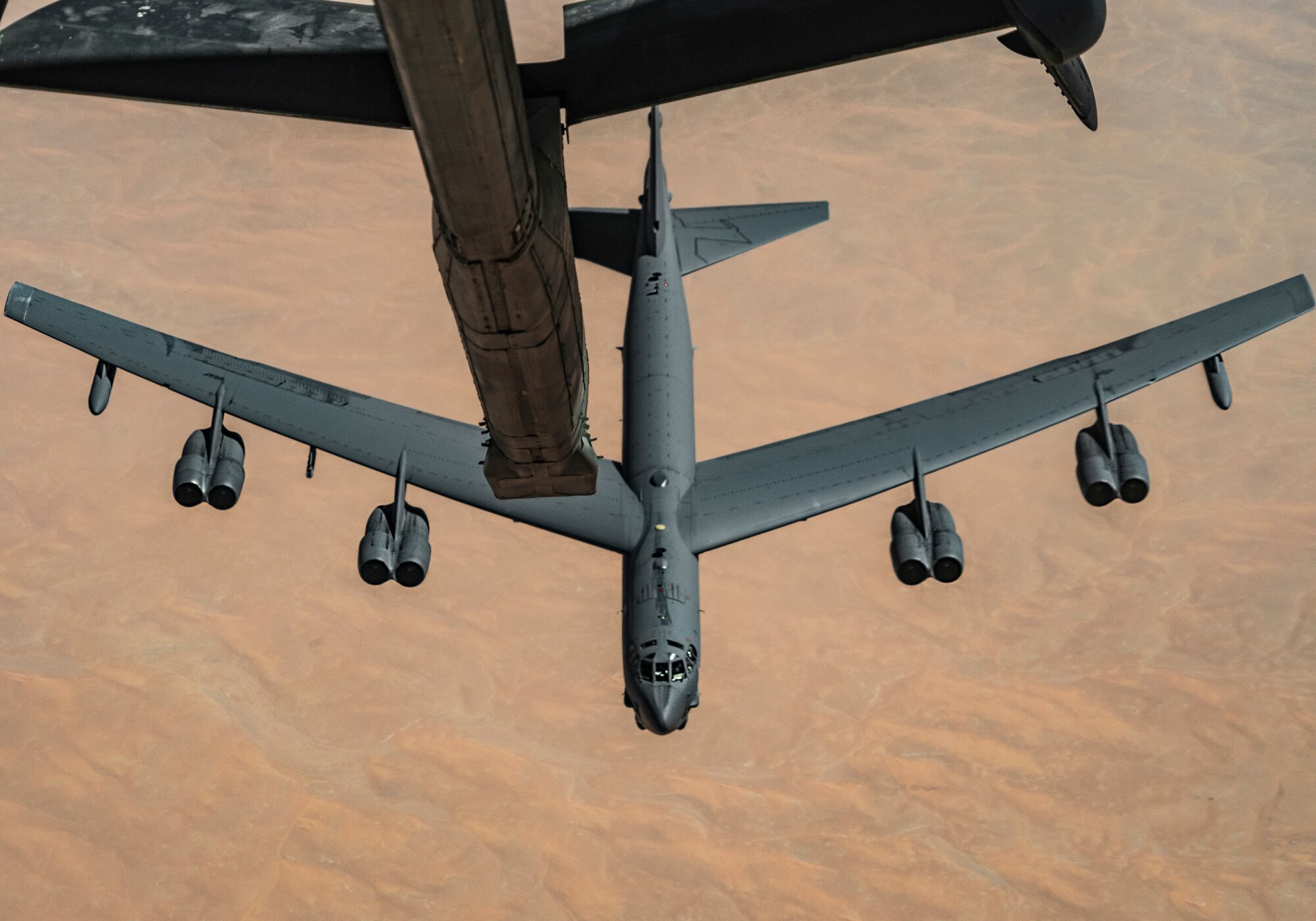 A U.S. Air Force B-52 Stratofortress aircraft prepares to depart after receiving fuel from a KC-10 Extender aircraft during a bomber task force mission over the U.S. Central Command area of responsibility, March 7th, 2021.