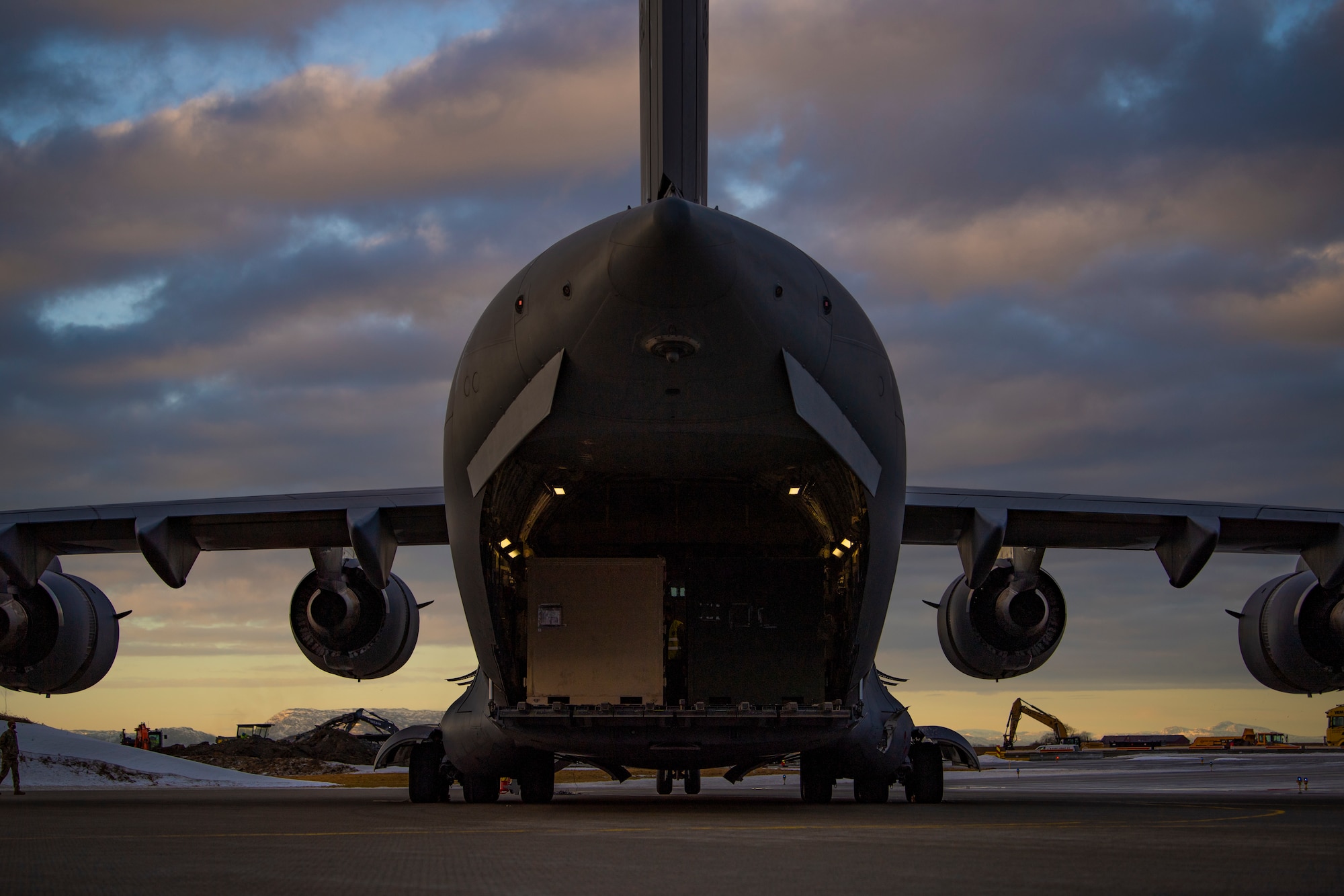 A C-17 Globemaster III, assigned to the 437th Airlift Wing, sits on the flightline at Ørland Air Force Station, Norway, Feb. 23, 2021. The C-17 delivered cargo and equipment needed to ensure success during Bomber Task Force Europe missions. (U.S. Air Force photo by Airman 1st Class Colin Hollowell)