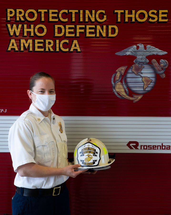 Firefighter Brandee Ridgway made history during her promotion from fire prevention inspector to assistant chief of Fire Prevention, Cherry Point Fire and Emergency Services, March 1, 2021, at Marine Corps Air Station Cherry Point, North Carolina. Ridgway is the first female assistant chief within a Cherry Point Fire Department. (U.S. Marine Corps photo by Staff Sgt. Caitlin Brink)