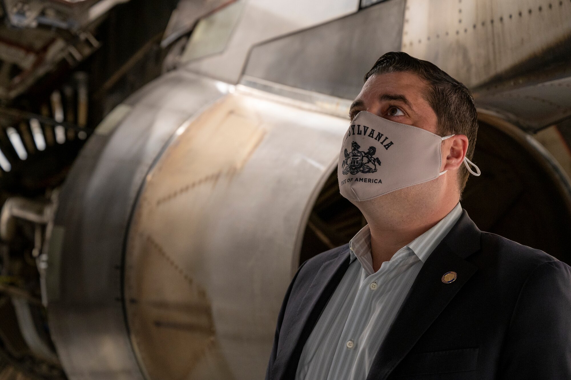 Pennsylvania State Sen. Devlin Robinson looks at a C-17 Globemaster III assigned to the 911th Airlift Wing at the Pittsburgh International Airport Air Reserve Station, Pennsylvania, Feb. 26, 2021.